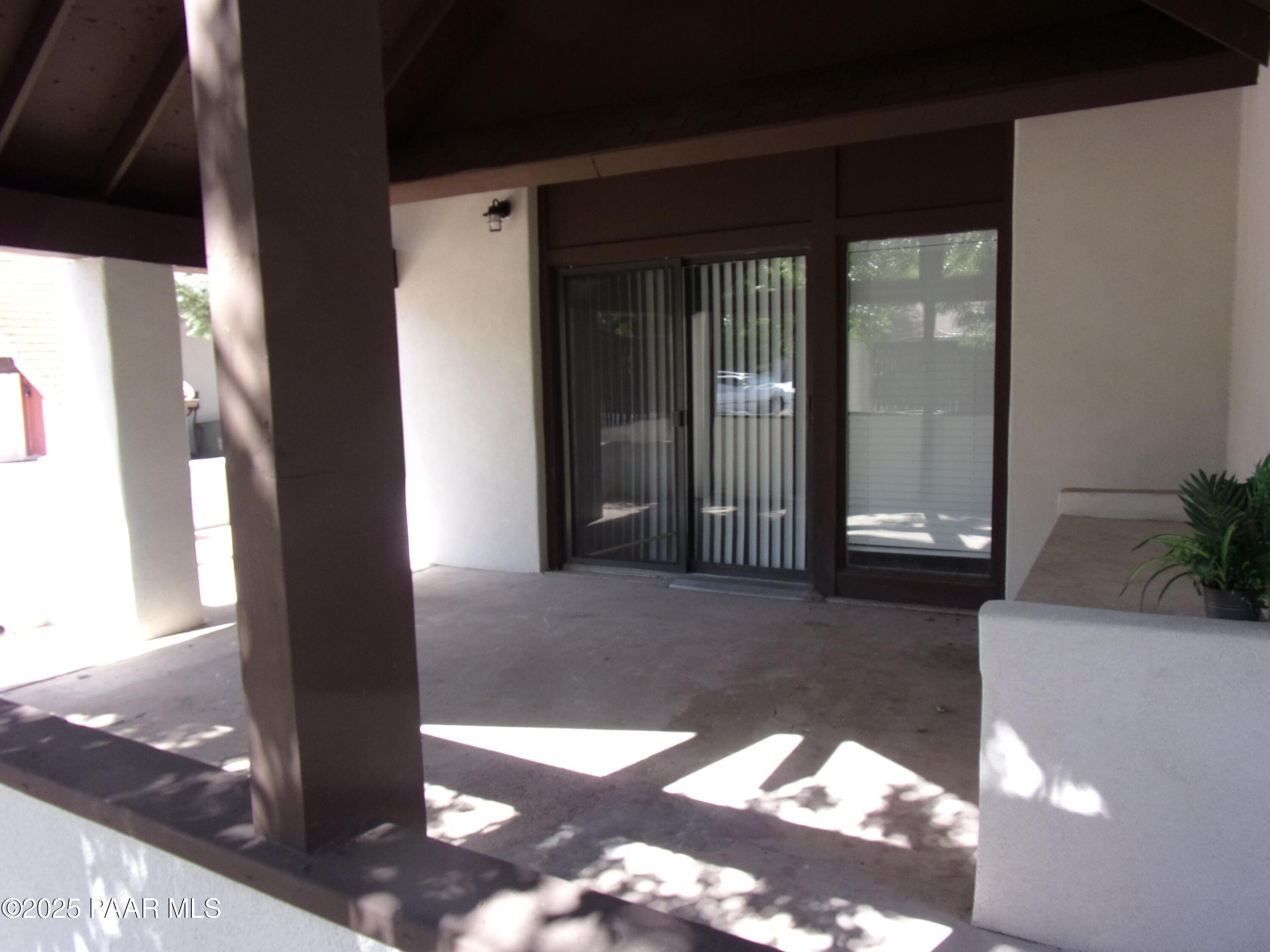 5280 Diamond Drive, Unit A Prescott, AZ 86301 - Photo 10 of 11 a view of a hallway with wooden floor