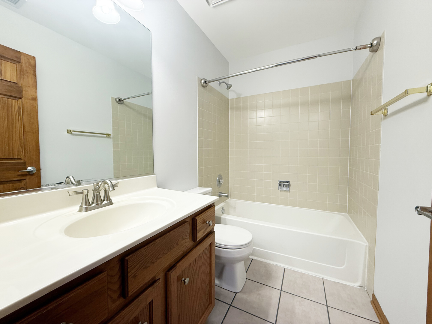 440 Mill Street Batavia, IL 60510 - Photo 11 of 17 a bathroom with a sink a toilet and shower
