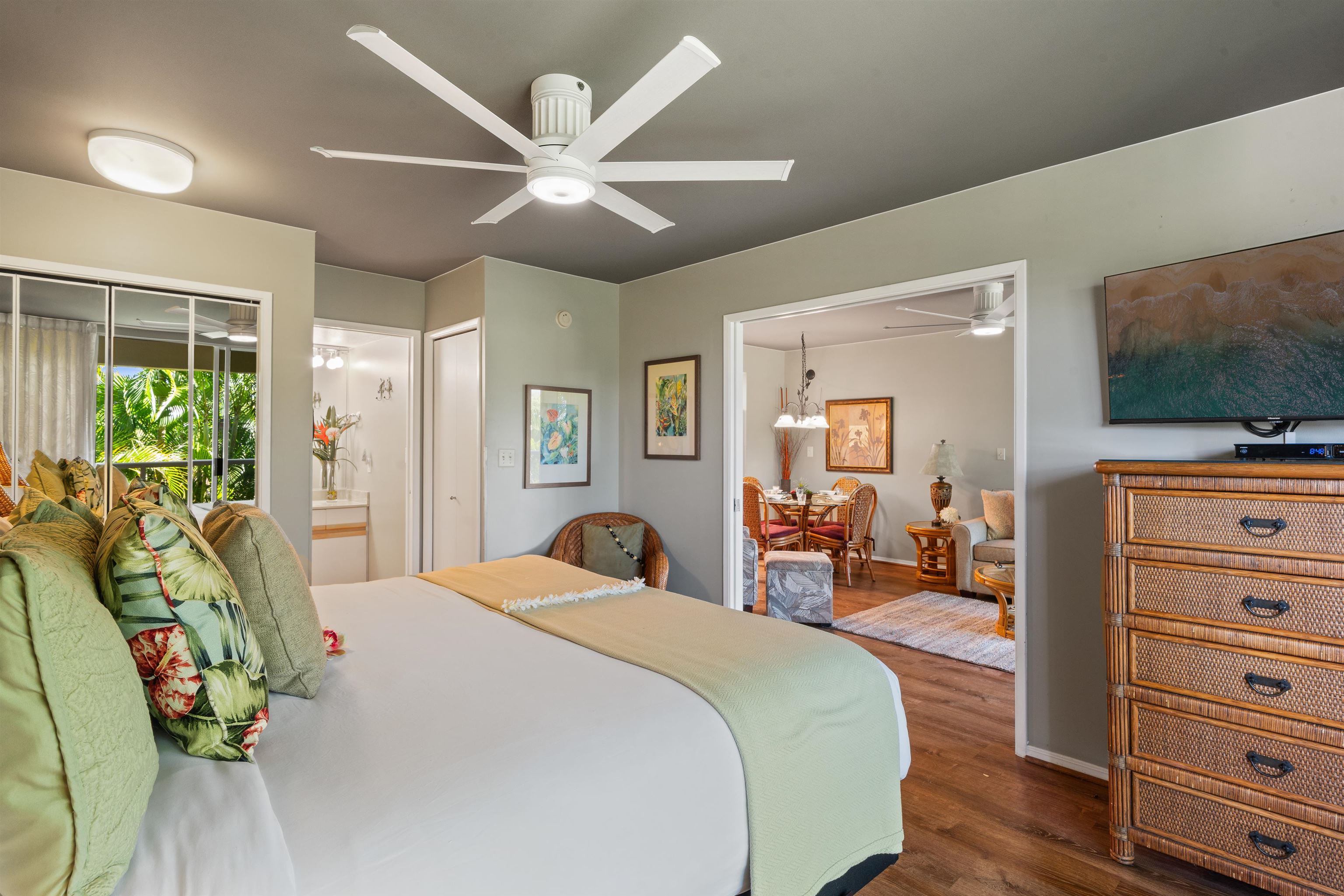 2575 South Kihei Road, Unit H207 Kihei, HI 96753 - Photo 15 of 31 a spacious bedroom with a bed and a flat screen tv