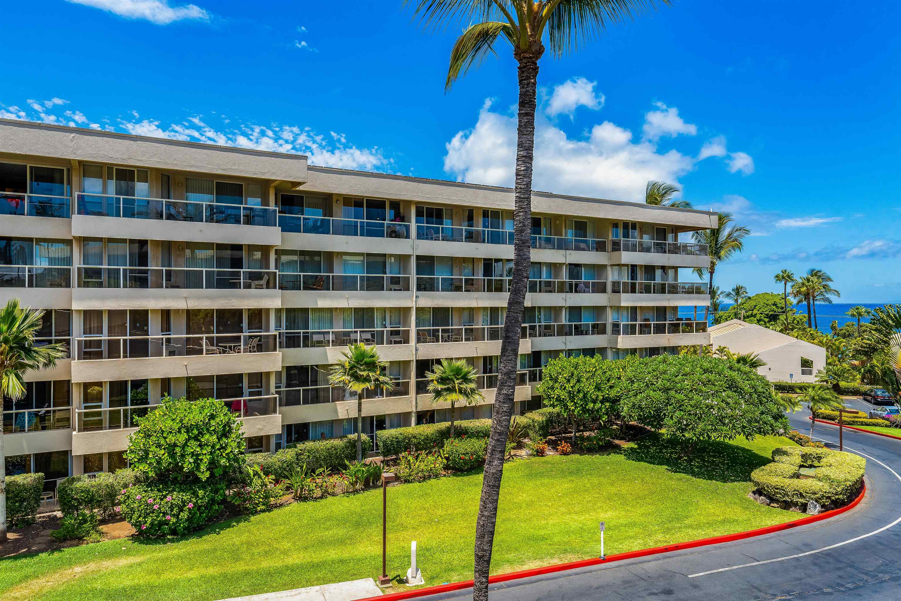 2575 South Kihei Road, Unit H207 Kihei, HI 96753 - Photo 23 of 31 a front view of a building with garden