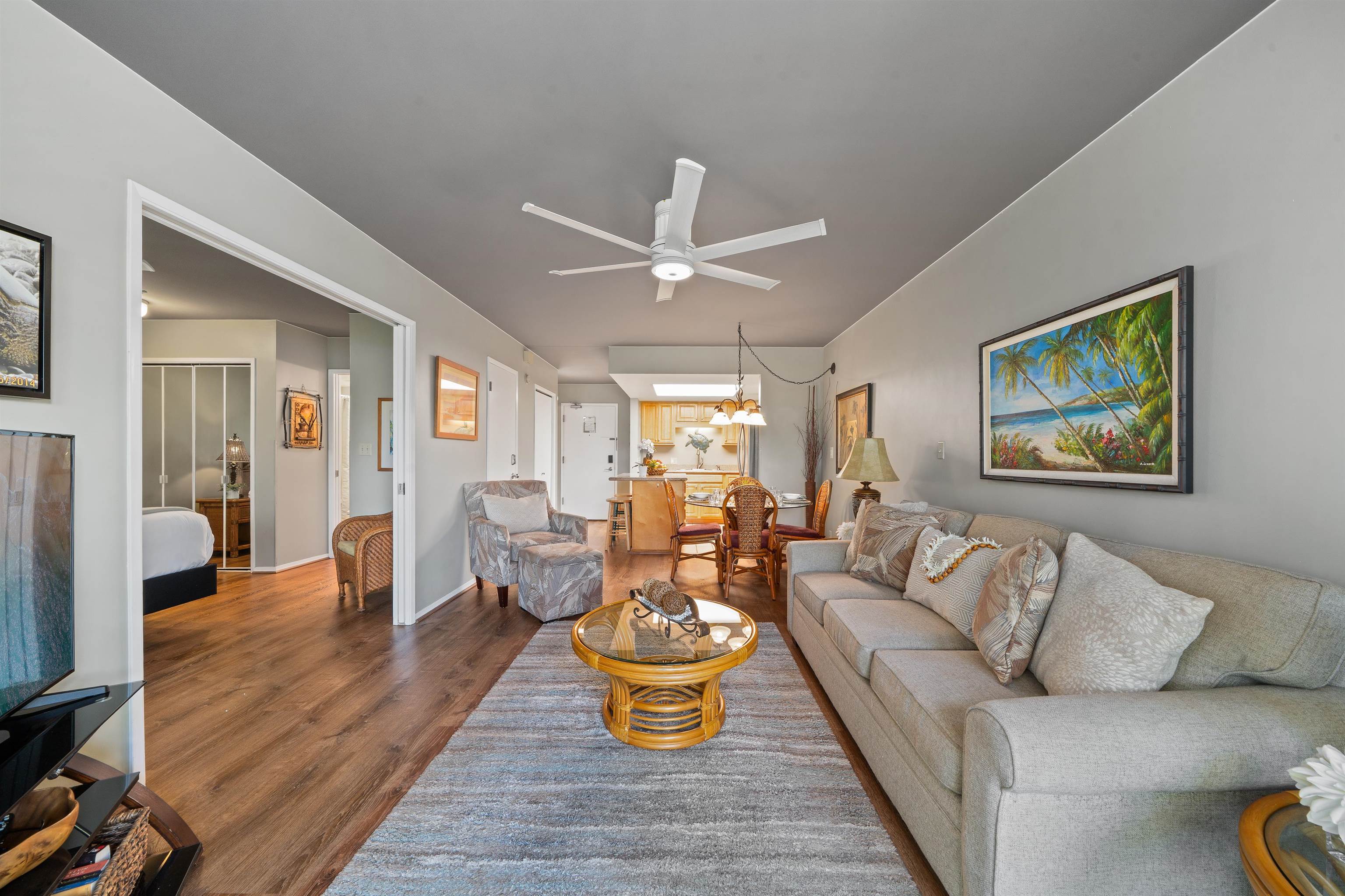 2575 South Kihei Road, Unit H207 Kihei, HI 96753 - Photo 8 of 31 a living room with furniture and a large window