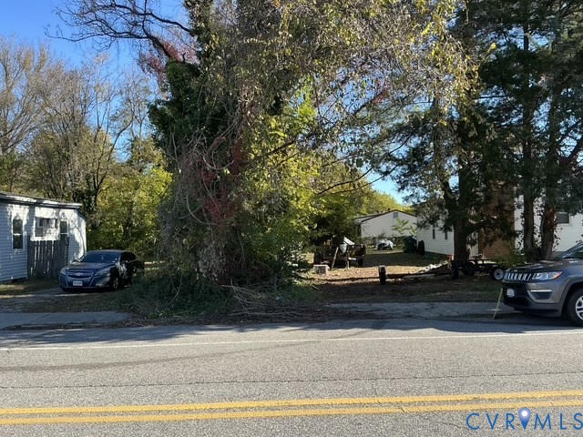 309 North Crater Road Petersburg, VA 23803 - Photo 1 of 5 a view of street with parked cars