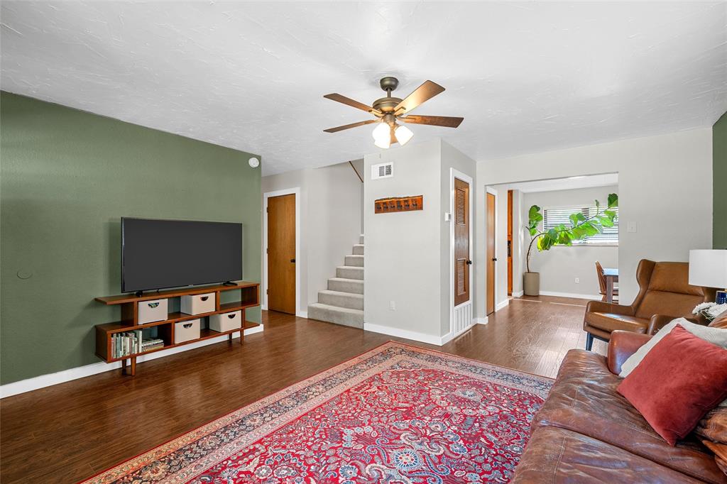 3000 North 15th A Street Waco, TX 76708 - Photo 5 of 24 a living room with furniture and a flat screen tv