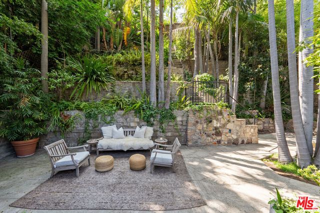 a view of a swimming pool in the backyard