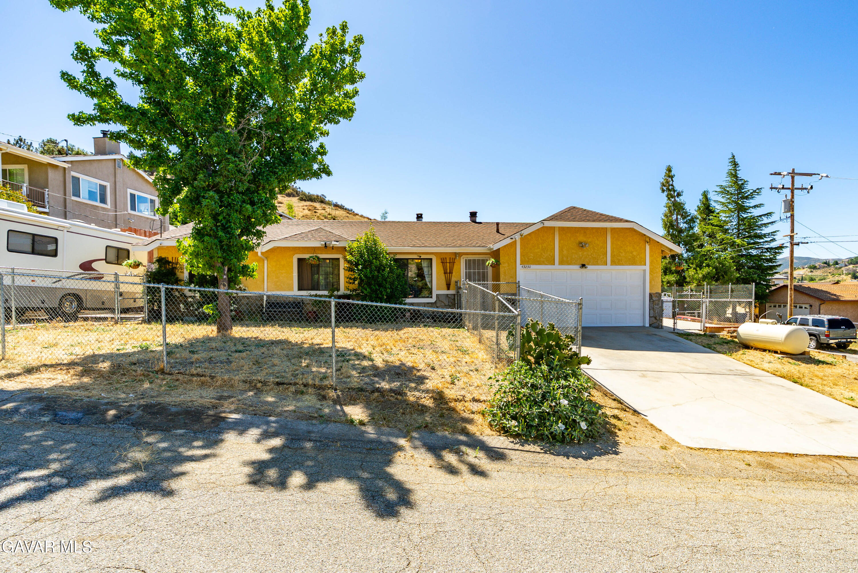 43230 Lookabout Road Lake Hughes, CA 93532 - Photo 1 of 35 a front view of a house with a yard