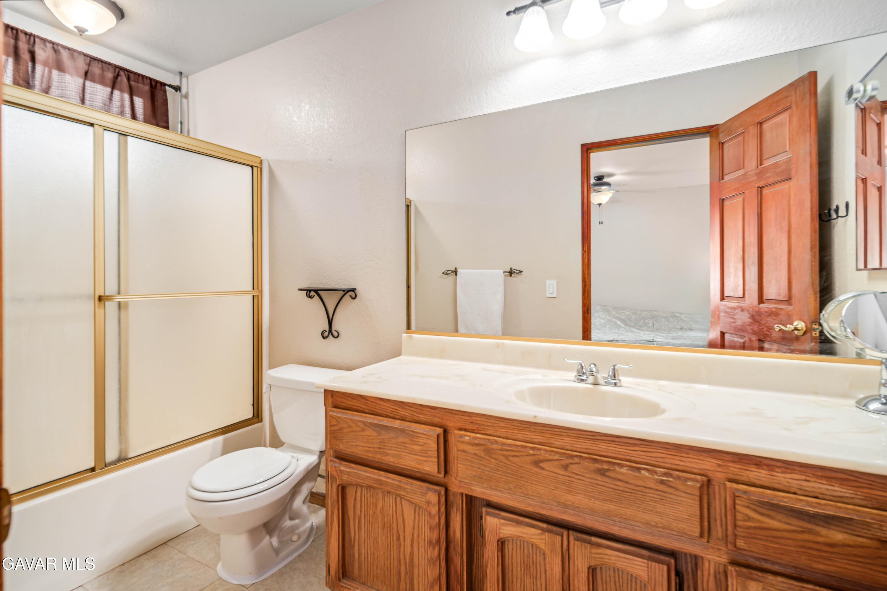 43230 Lookabout Road Lake Hughes, CA 93532 - Photo 12 of 35 a bathroom with a sink a toilet and shower