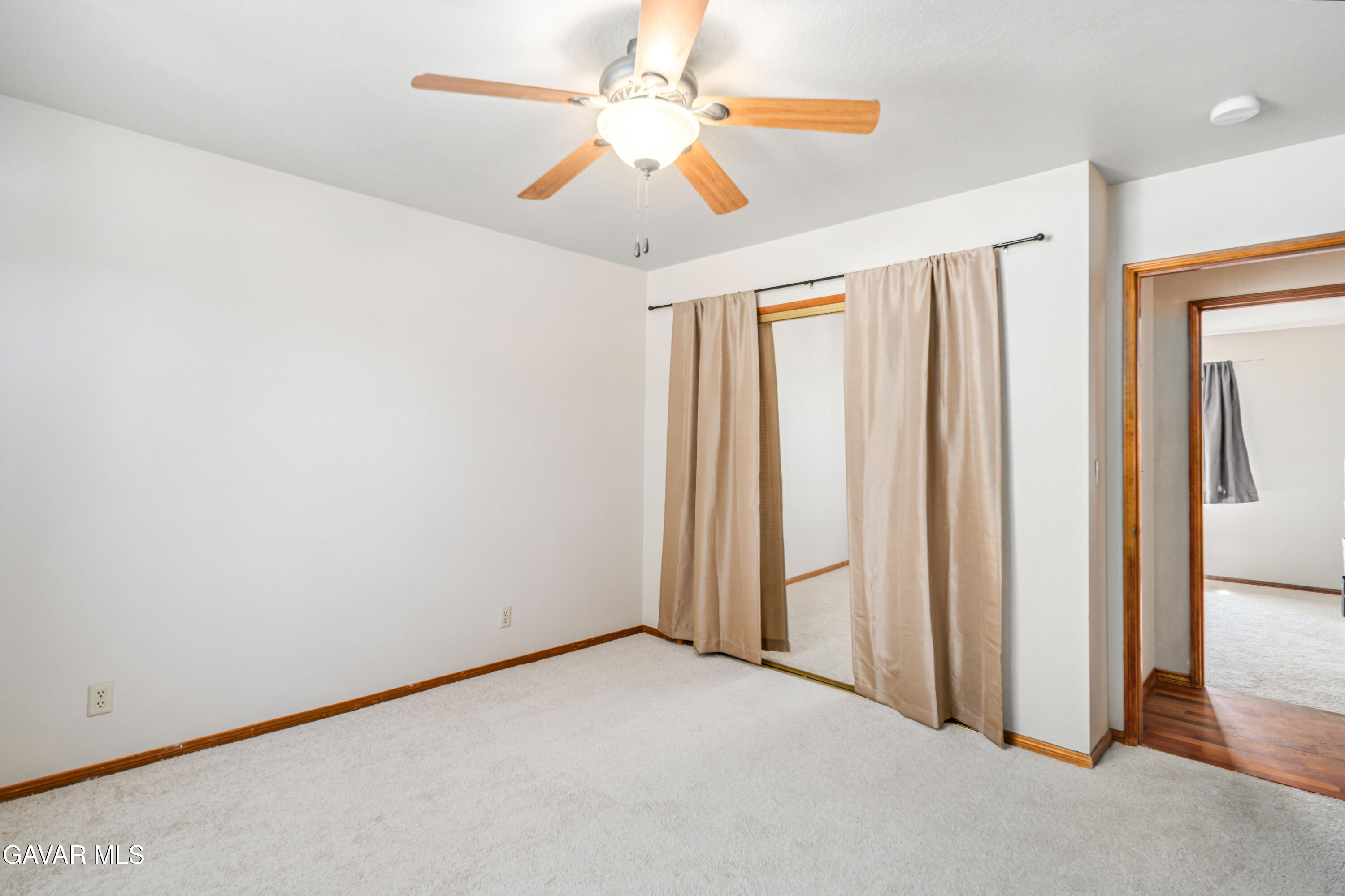 43230 Lookabout Road Lake Hughes, CA 93532 - Photo 15 of 35 an empty room with windows and fan