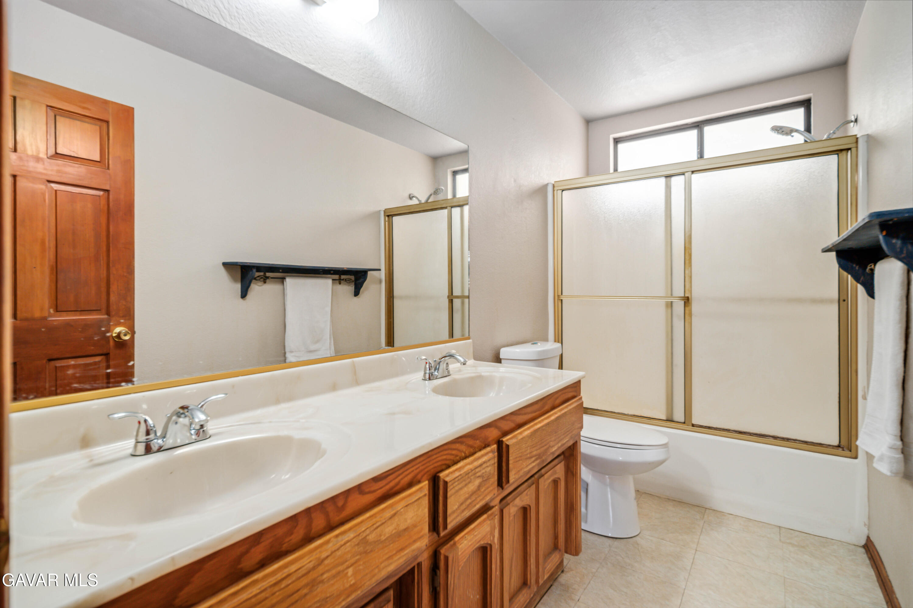 43230 Lookabout Road Lake Hughes, CA 93532 - Photo 17 of 35 a bathroom with a granite countertop sink toilet and shower