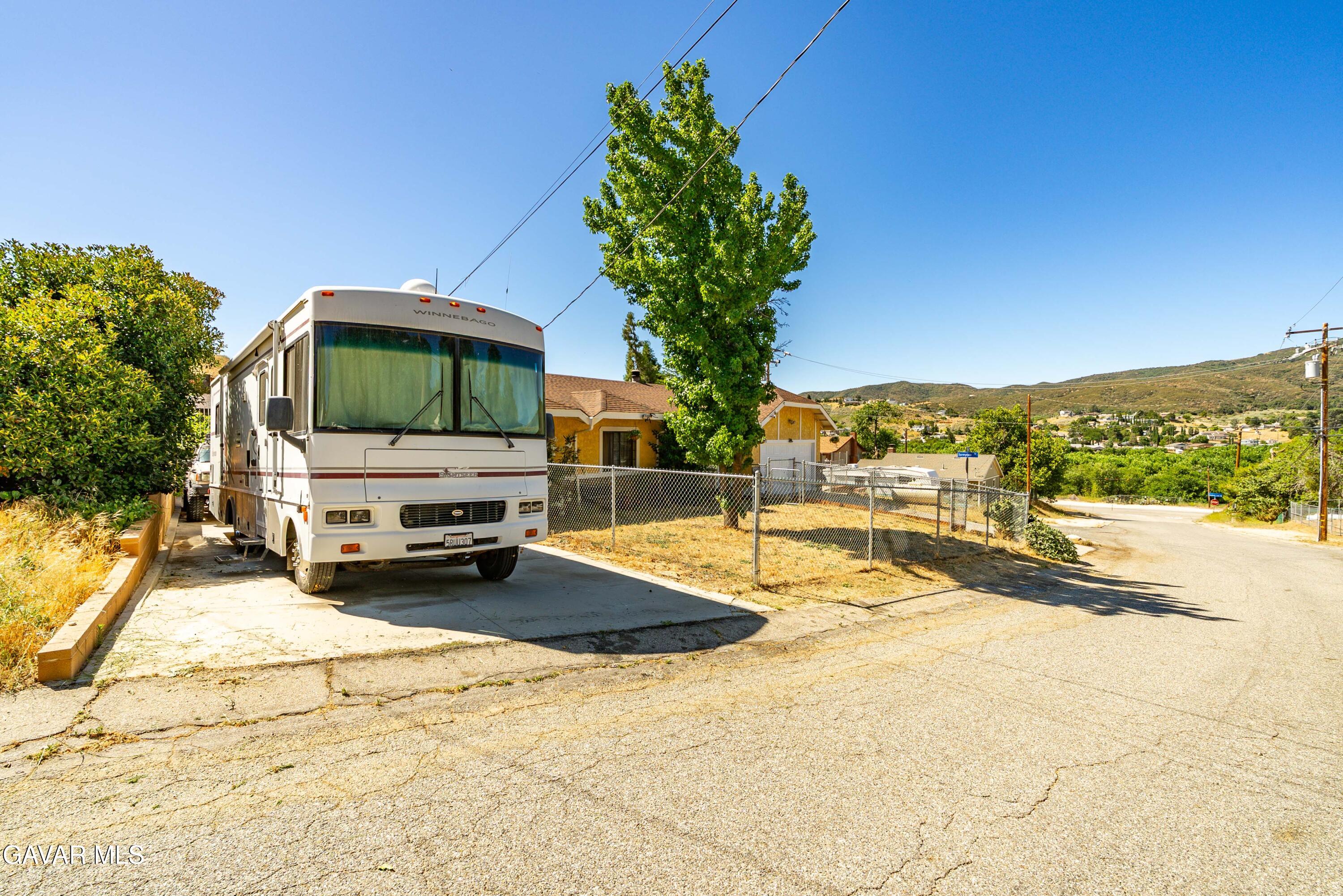 43230 Lookabout Road Lake Hughes, CA 93532 - Photo 29 of 35 a swimming pool with outdoor seating and yard