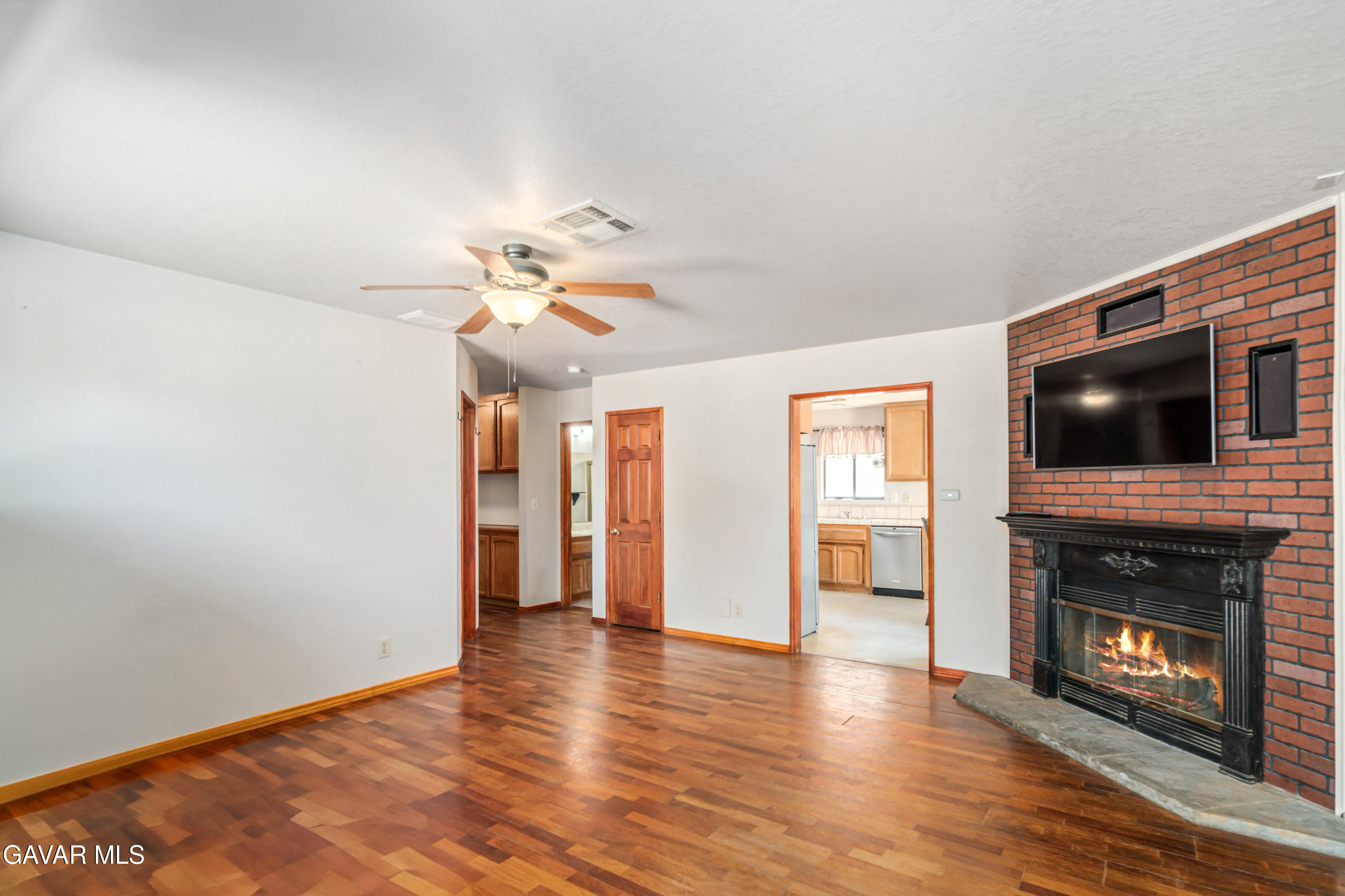 43230 Lookabout Road Lake Hughes, CA 93532 - Photo 3 of 35 a view of an empty room with window and fire place