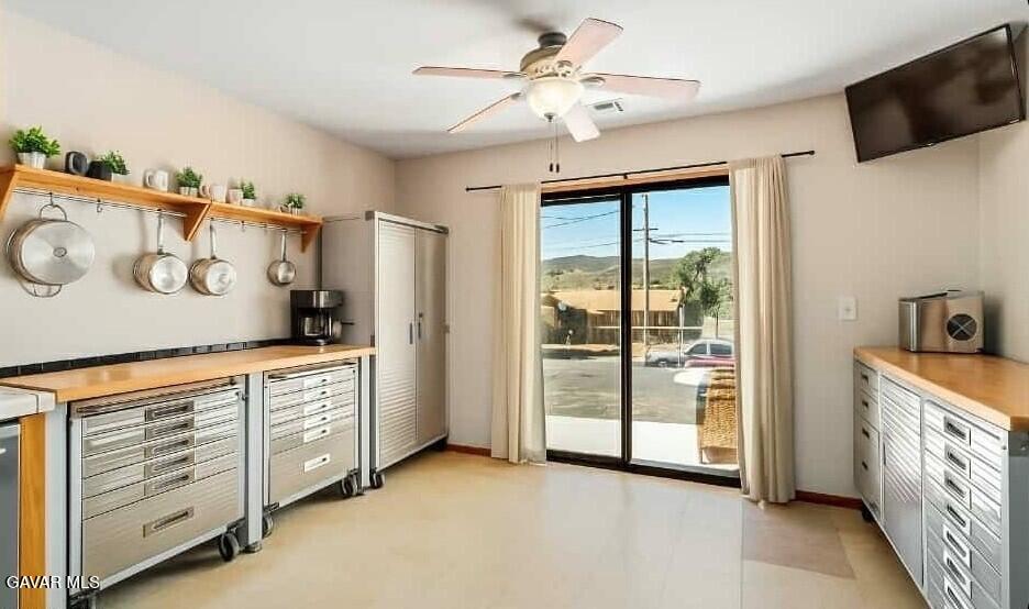 43230 Lookabout Road Lake Hughes, CA 93532 - Photo 9 of 35 a view of a kitchen with fridge and a sink