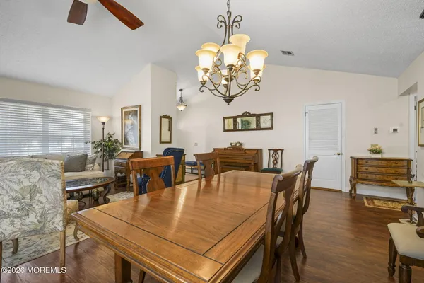 a view of a dining room with furniture