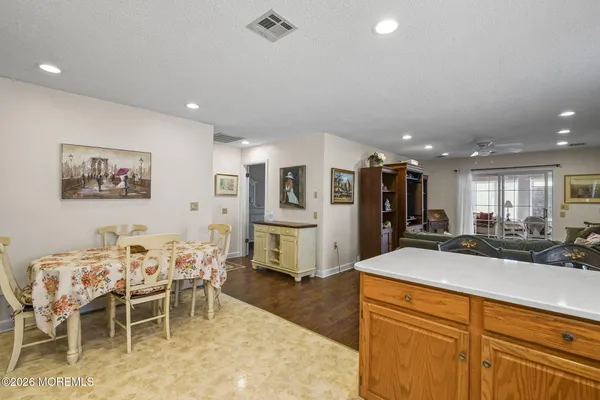 a view of a dining room with furniture