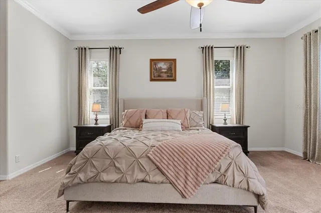 a bathroom with a granite countertop toilet a sink and a mirror