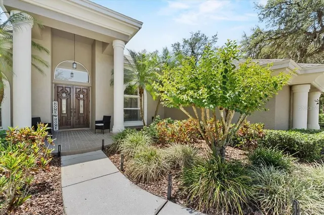 a kitchen with a stove and a refrigerator