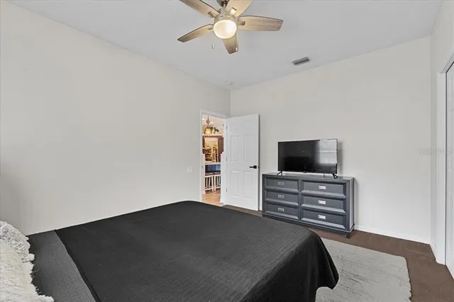 an aerial view of a house with outdoor space