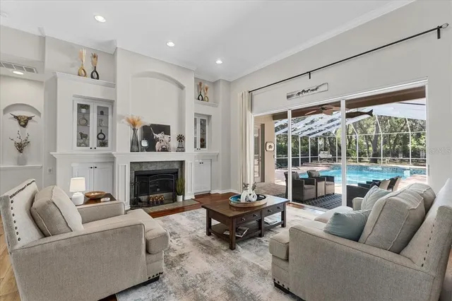 a view of a hallway view with wooden floor and dining room view