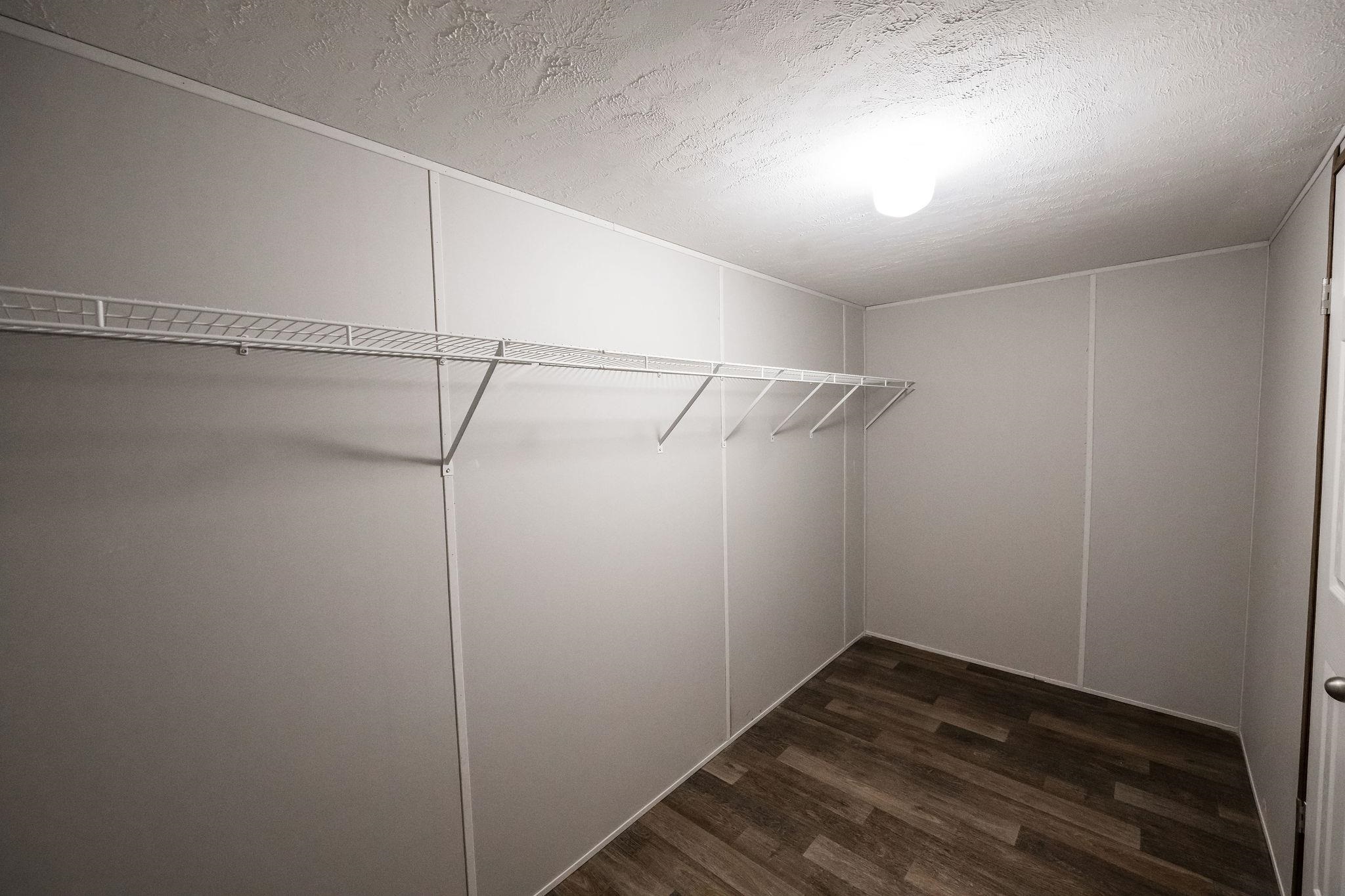 283 Clements Way Fruita, CO 81521 - Photo 16 of 16 a view of a room with racks on the wall