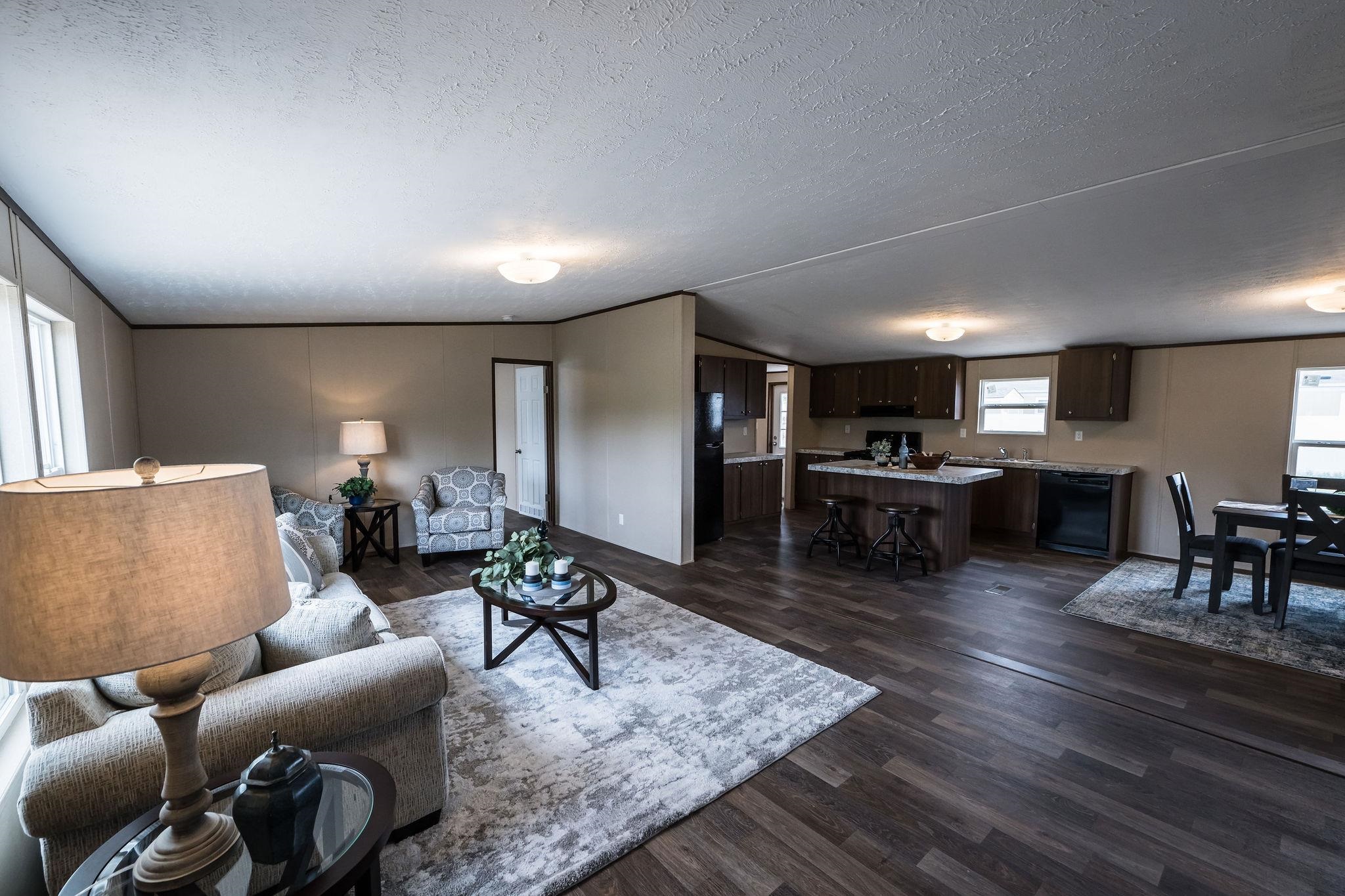 283 Clements Way Fruita, CO 81521 - Photo 4 of 16 a living room with furniture and wooden floor