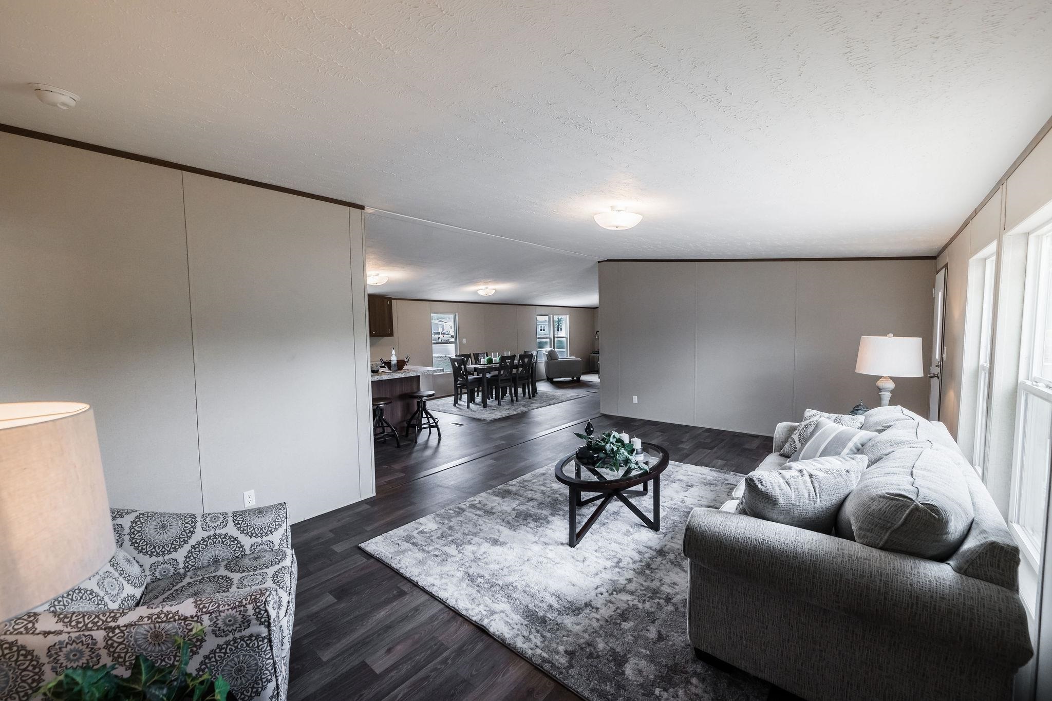 283 Clements Way Fruita, CO 81521 - Photo 6 of 16 a living room with furniture and a table