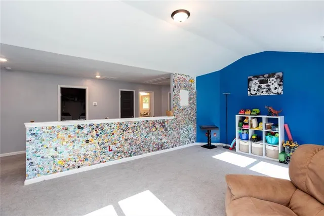 a living room with furniture and a couch