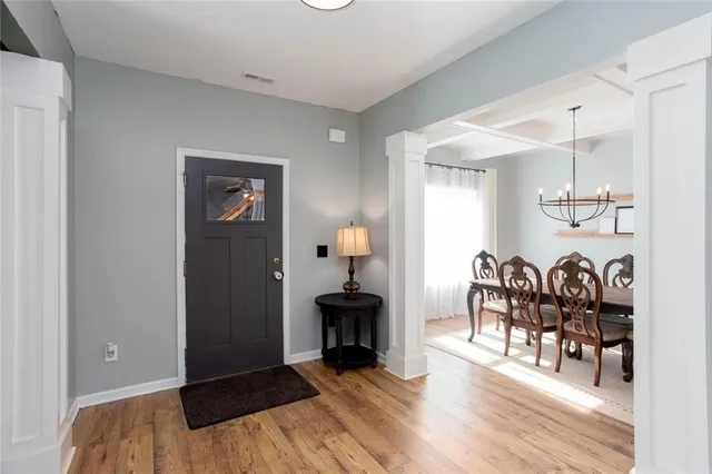 a view of a livingroom with furniture and wooden floor