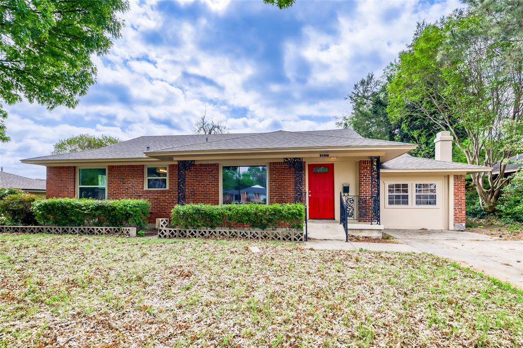 6612 East Mockingbird Lane Dallas, TX 75214 - Photo 1 of 28 a front view of a house with garden
