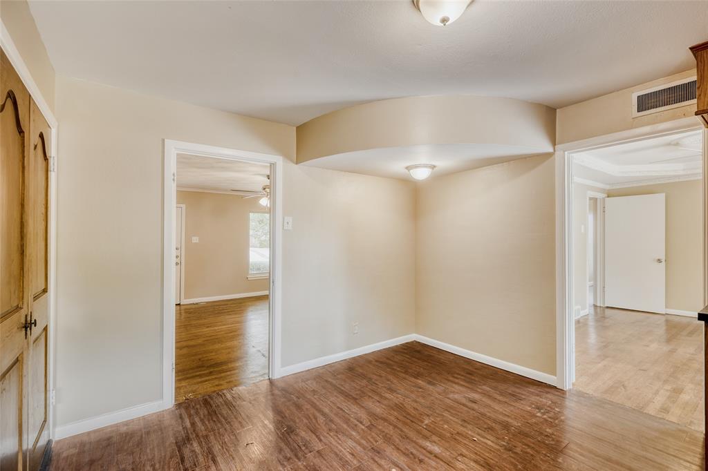 6612 East Mockingbird Lane Dallas, TX 75214 - Photo 4 of 28 a view of empty room with wooden floor