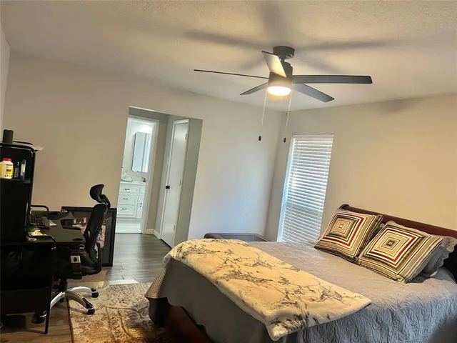 a bathroom with a double vanity sink and mirror