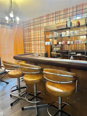 a view of a bathroom with a sink and a shower