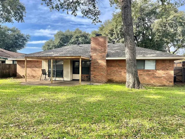 a view of kitchen and wooden floor