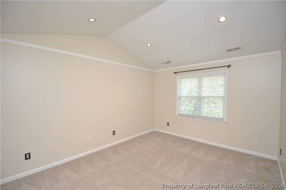 1404 Woodline Drive Raleigh, NC 27603 - Photo 16 of 35 an empty room with a window