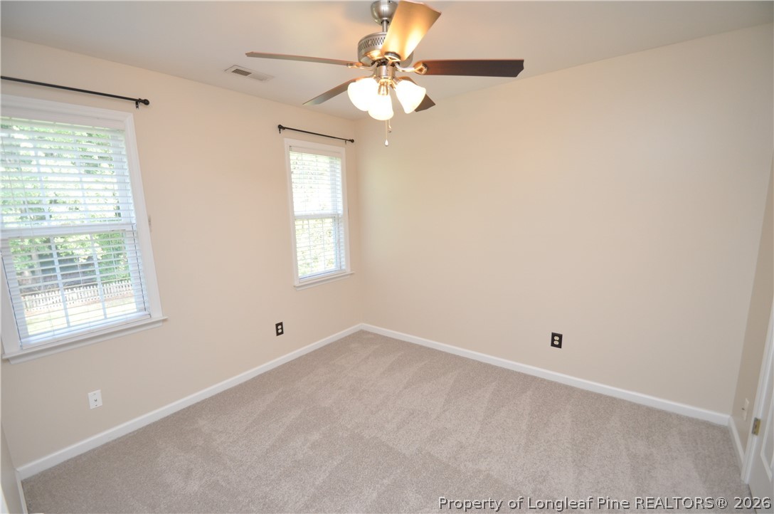 1404 Woodline Drive Raleigh, NC 27603 - Photo 23 of 35 a view of an empty room with a window