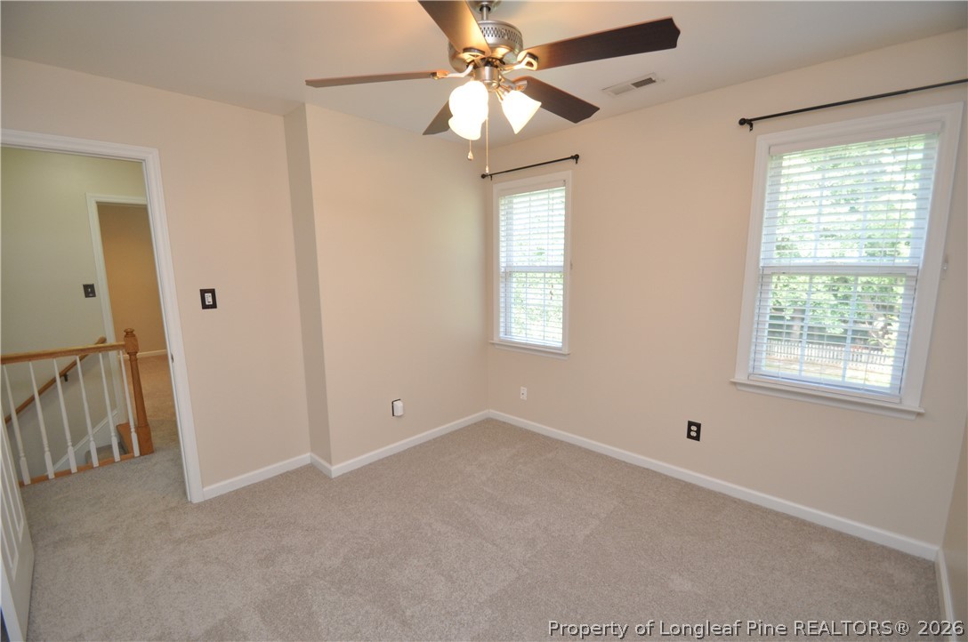 1404 Woodline Drive Raleigh, NC 27603 - Photo 24 of 35 a view of an empty room with a window