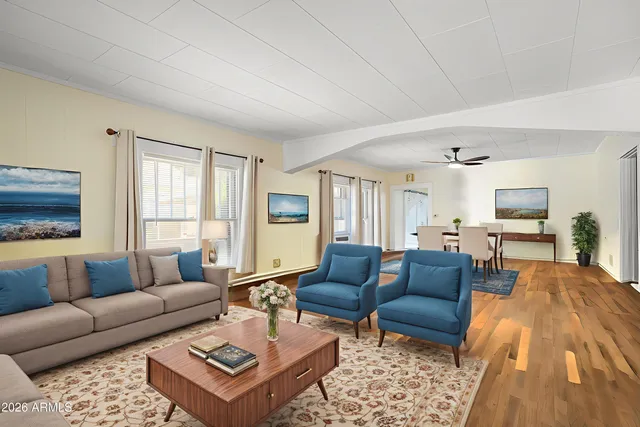 a living room with furniture and a couch