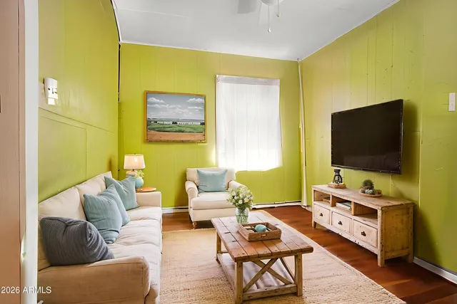 a kitchen with stainless steel appliances granite countertop a sink and a stove