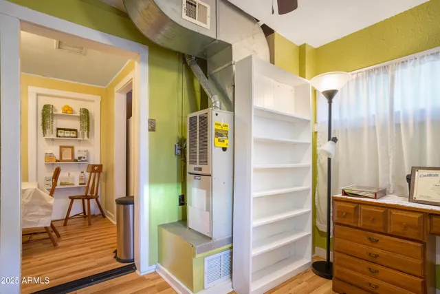 a view of a workspace with furniture