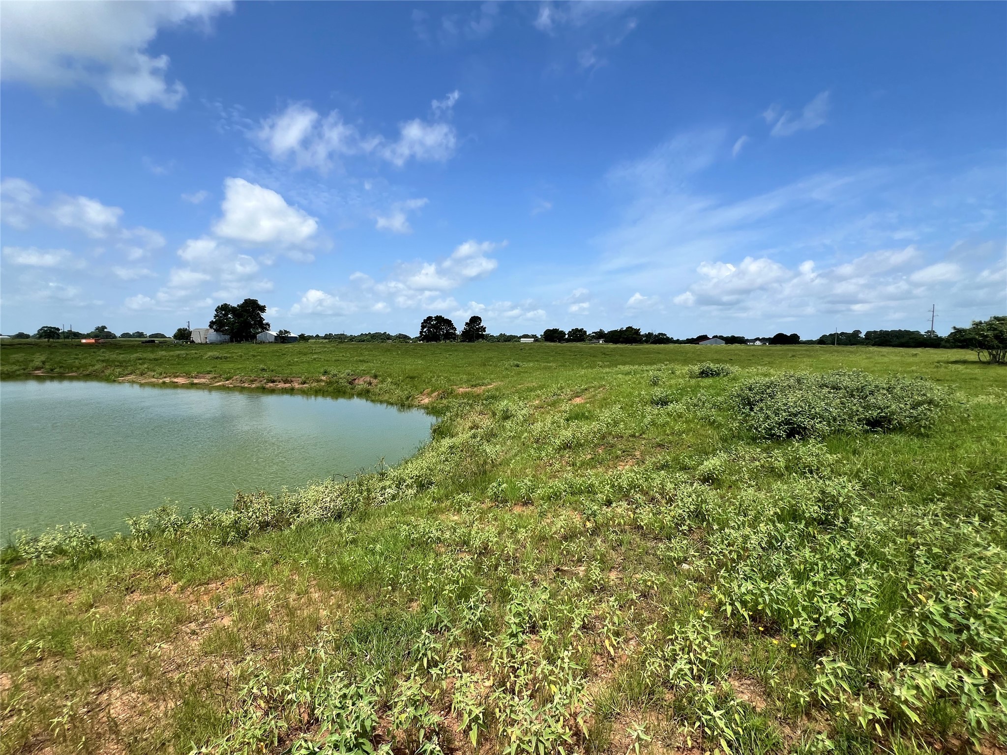 20573 Fontenot Lane Hempstead, TX 77445 - Photo 12 of 36 a view of a lake and sunset