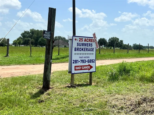 a sign on the side of the park