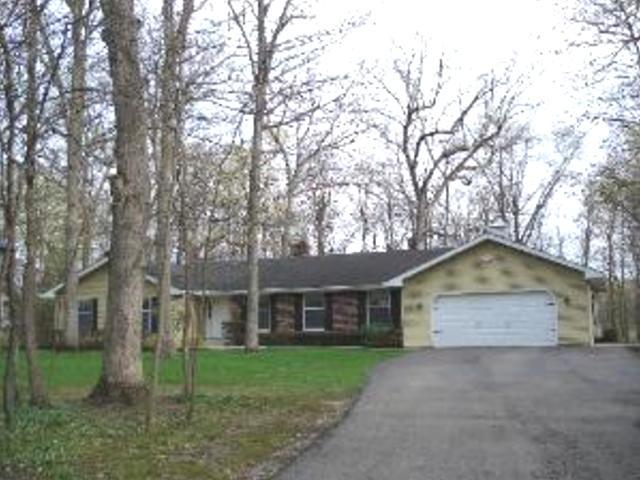 11636 Deerpath Road Sycamore, IL 60178 - Photo 1 of 5 a view of a house with a yard and large tree