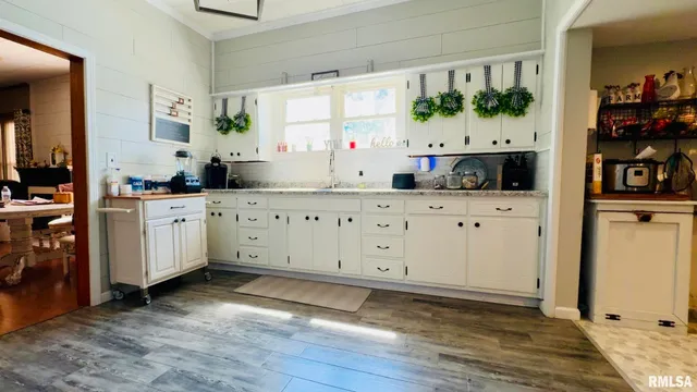 a room with cabinets and window