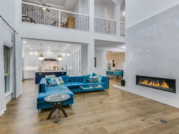 a living room with furniture and a table