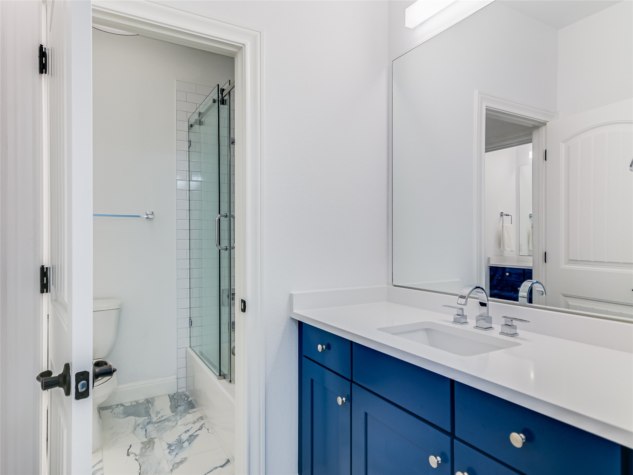 2625 Arion Circle Austin, TX 78730 - Photo 22 of 29 a bathroom with a sink and a mirror