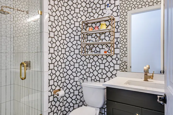 a bathroom with a sink and a toilet