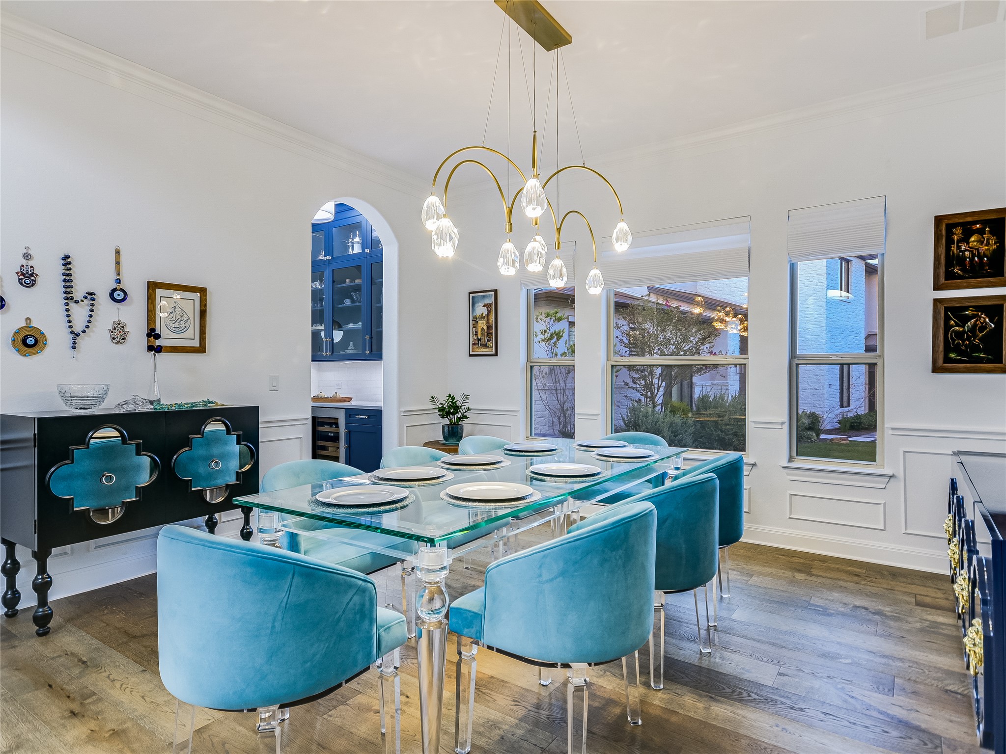 2625 Arion Circle Austin, TX 78730 - Photo 7 of 29 a dining room with furniture a kitchen and chandelier