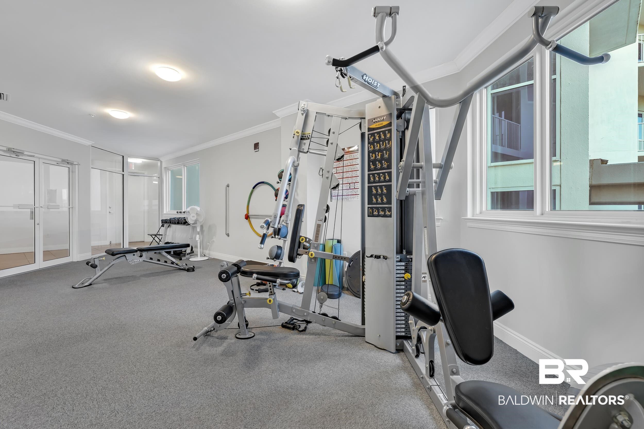 28250 Canal Road, Unit 307 Orange Beach, AL 36561 - Photo 43 of 56 Exercise area featuring crown molding