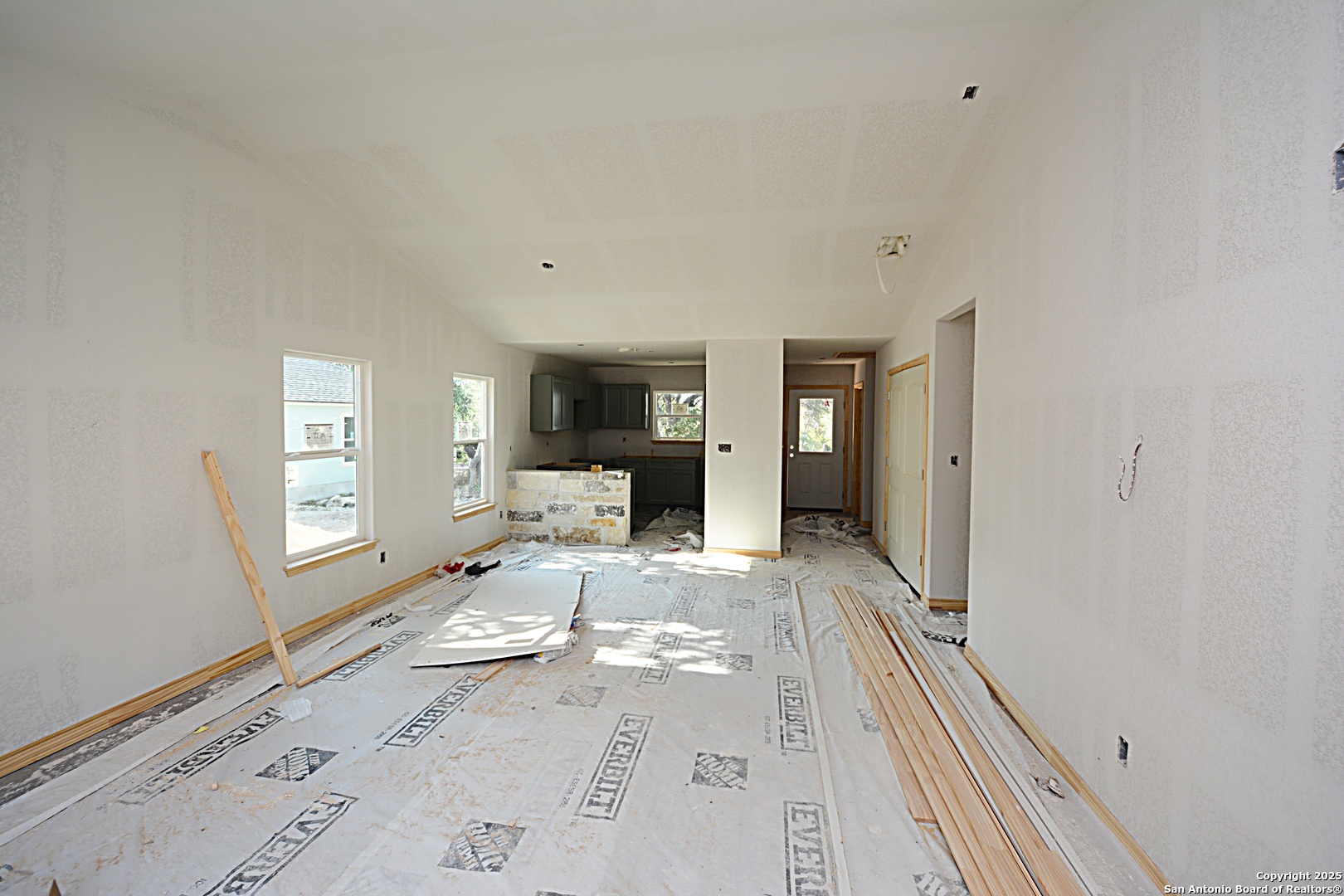 926 High Drive Spring Branch, TX 78070 - Photo 2 of 10 a hallway with white cabinets and wooden floor