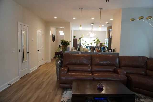 a white toilet sitting next to a bathroom sink