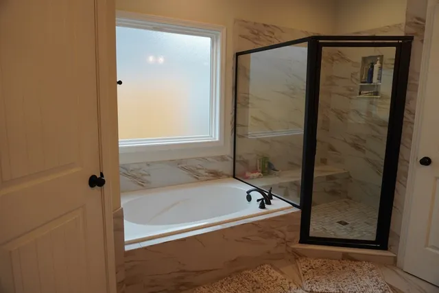 a living room with furniture or stairs and a wooden floor