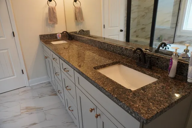 a living room with a couch and a chandelier